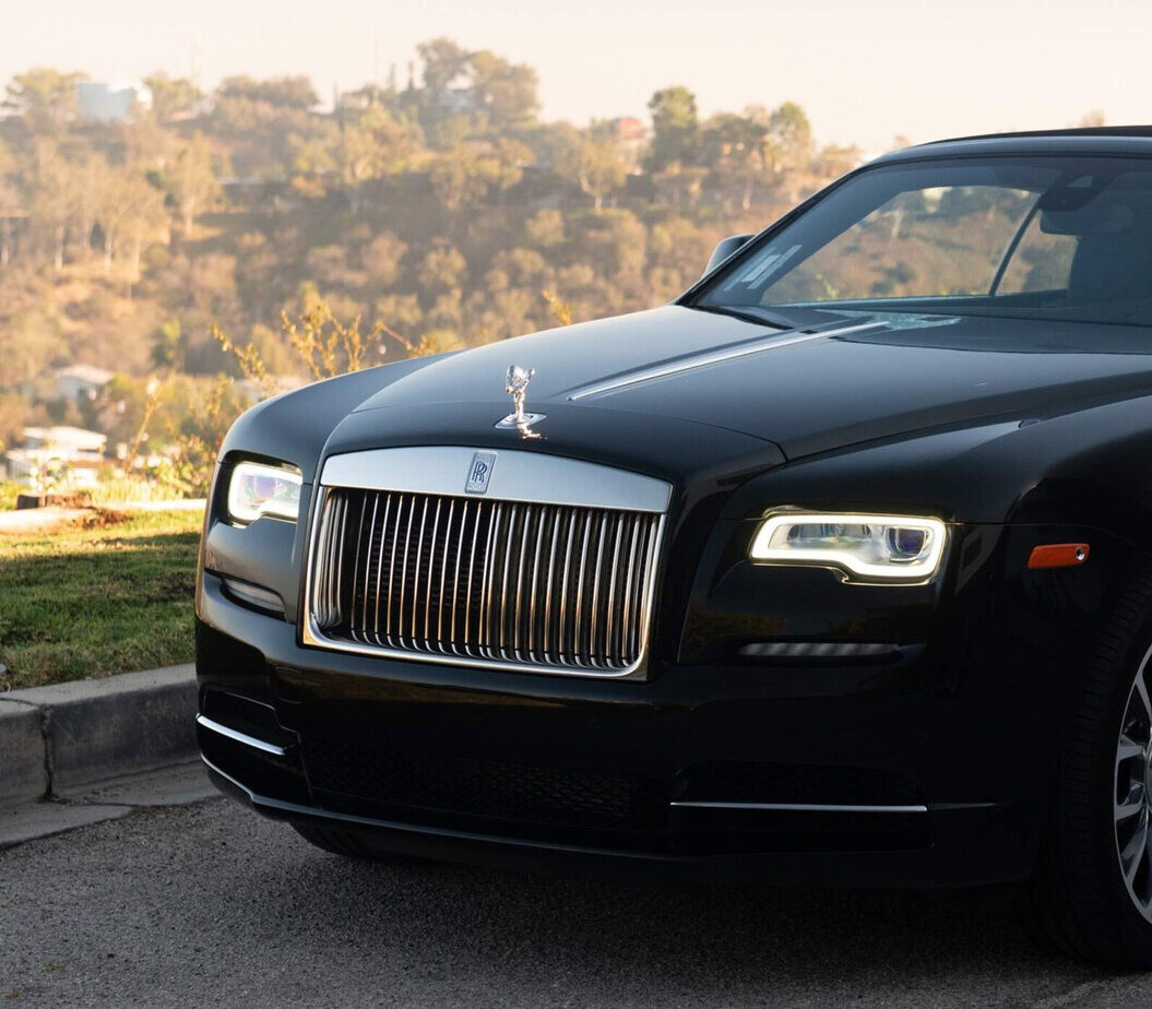 Luxury chauffeured vehicle at night