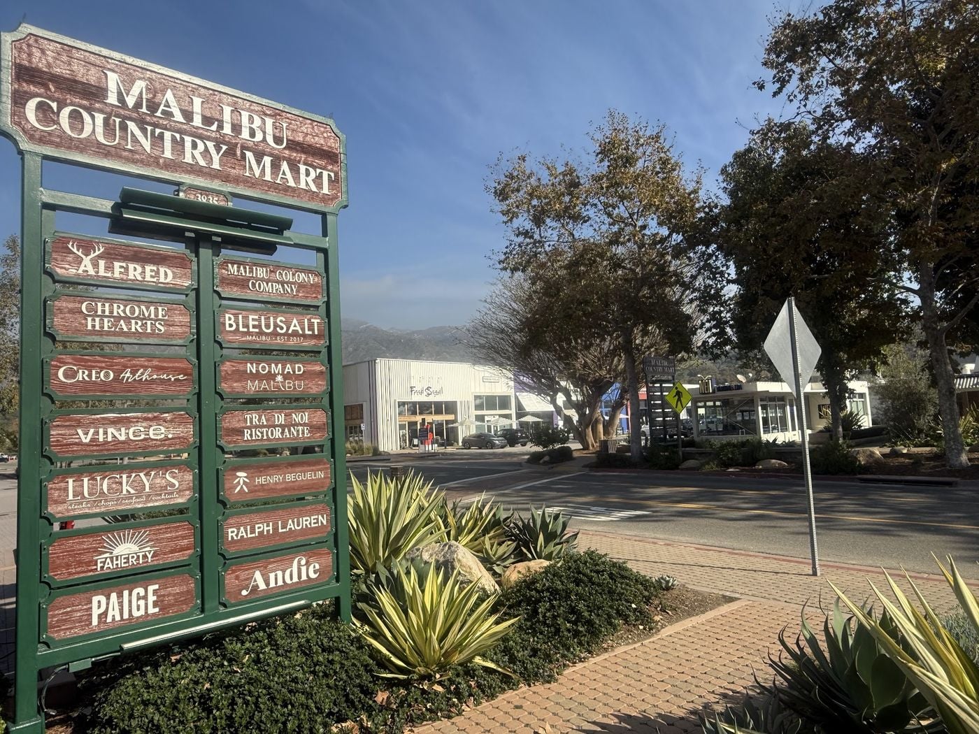 Malibu Country Mart sign with shop names on Cross Creek Road in Malibu